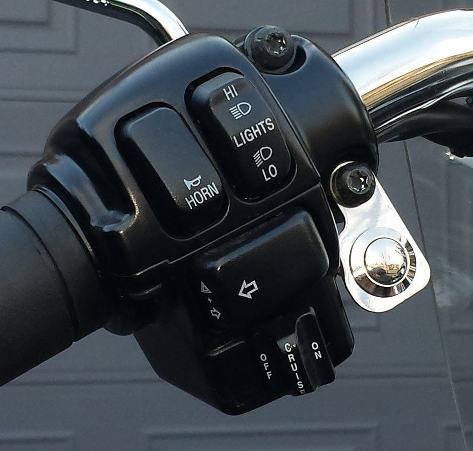 Remote garage door opener for motorcycles